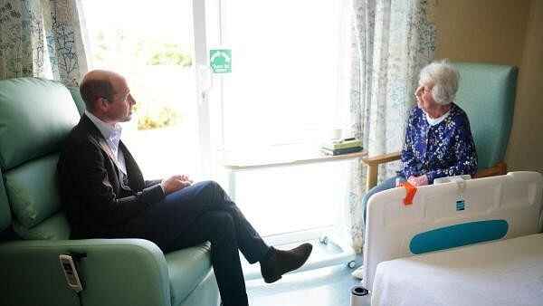 <div class="paragraphs"><p>Britain's Prince William speaks to a patient during a visit to St. Mary's Community Hospital on May 10, 2024.</p></div>