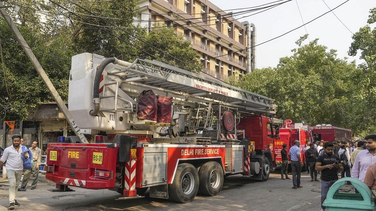 <div class="paragraphs"><p>Firefighting team outside the Income Tax CR Building after a fire broke out here, in ITO area of New Delhi.</p></div>