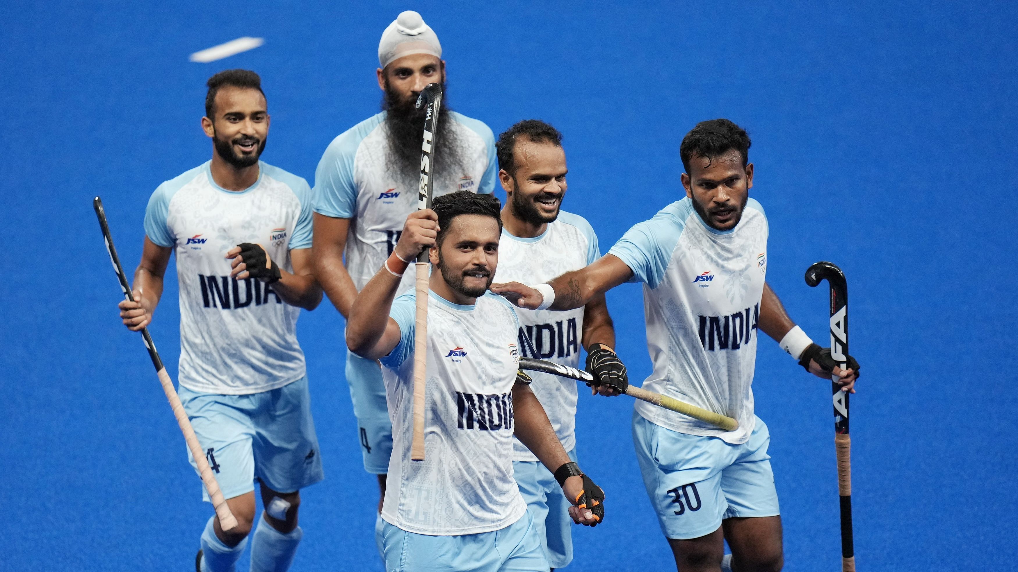 <div class="paragraphs"><p>Members of the Indian hockey team are pictured in this photo.</p></div>