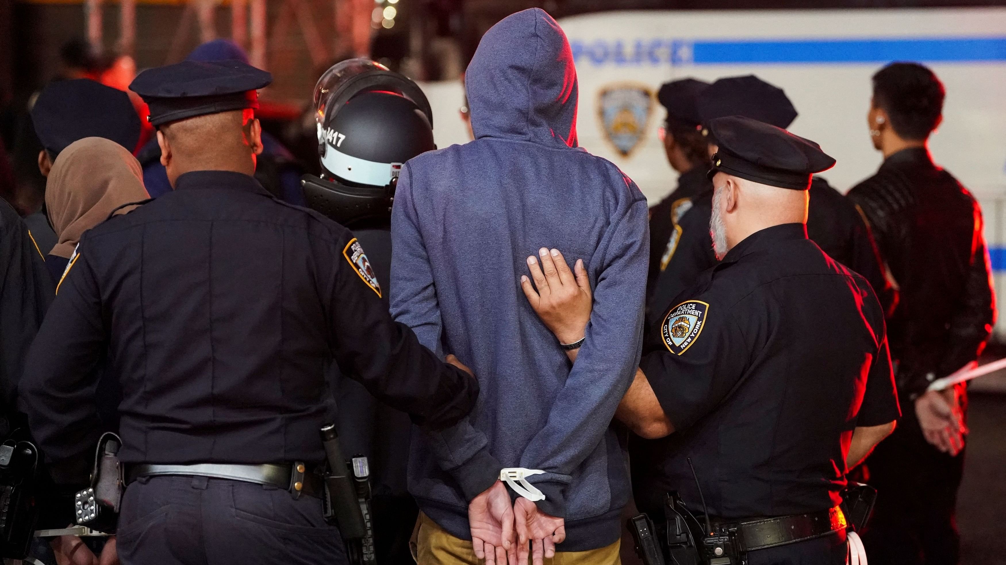 <div class="paragraphs"><p>Police detain a protestor, as other police officers enter the campus of Columbia University, during the ongoing conflict between Israel and the Palestinian Islamist group Hamas, in New York City, U., April 30, 2024. </p></div>