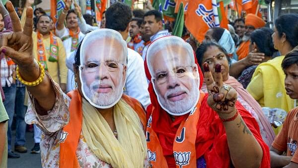 <div class="paragraphs"><p>BJP supporters during a roadshow of party candidate Taranjit Singh Sandhu, in Amritsar, Monday, May 27, 2024.</p></div>