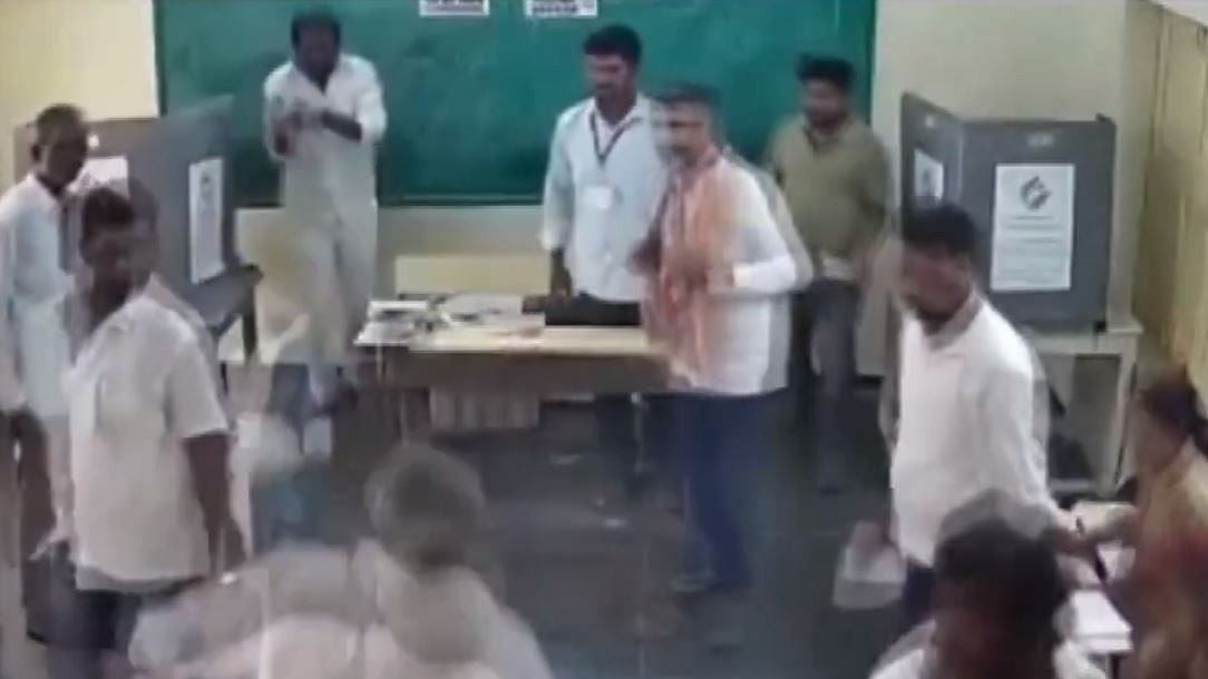 <div class="paragraphs"><p>Screengrab of the video showing YSRCP MLA&nbsp;P Ramakrishna Reddy (on the left corner) throwing an EVM machine.</p></div>