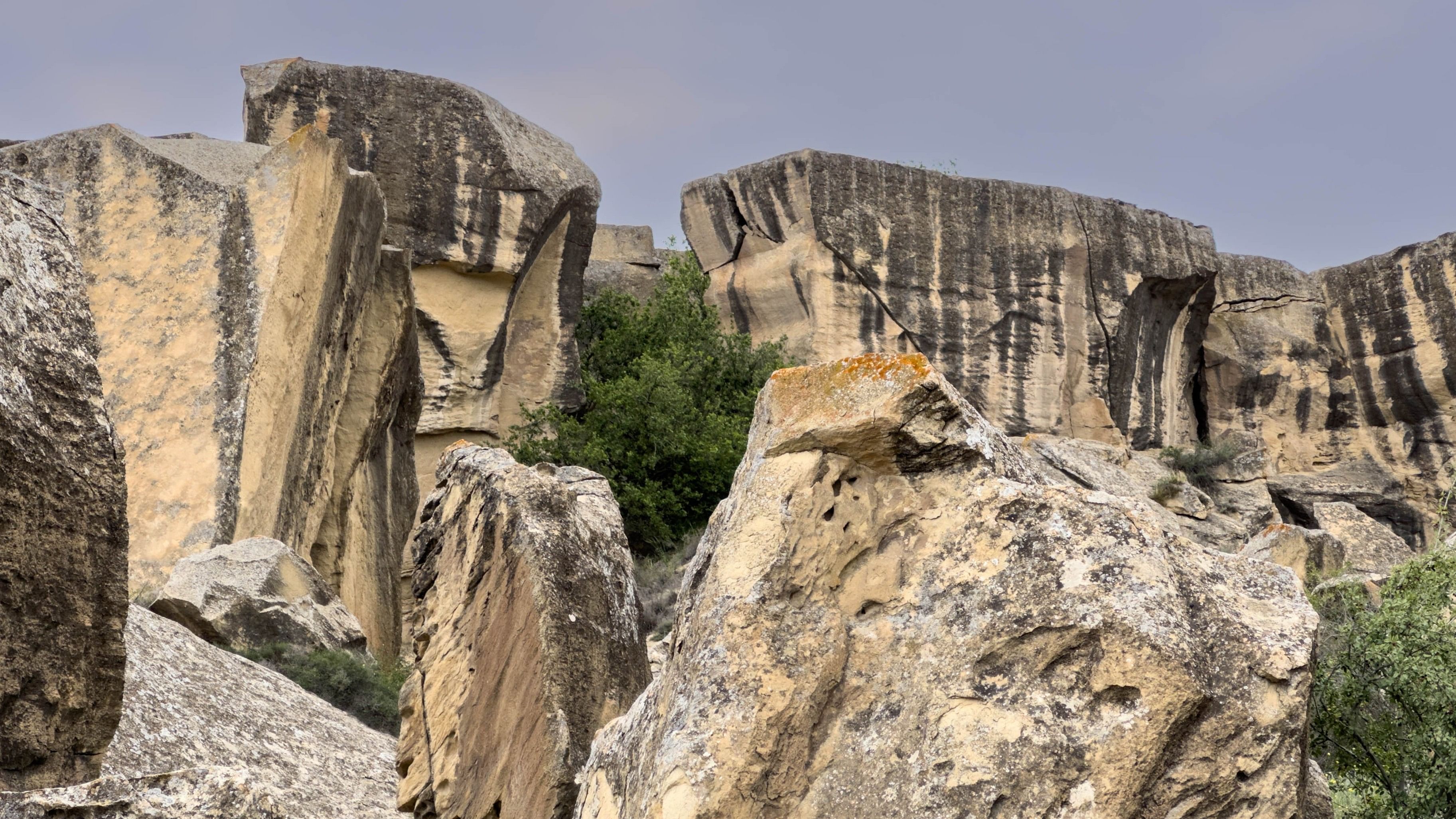 <div class="paragraphs"><p>Crumbling rock shelters of Gobustan. </p></div>