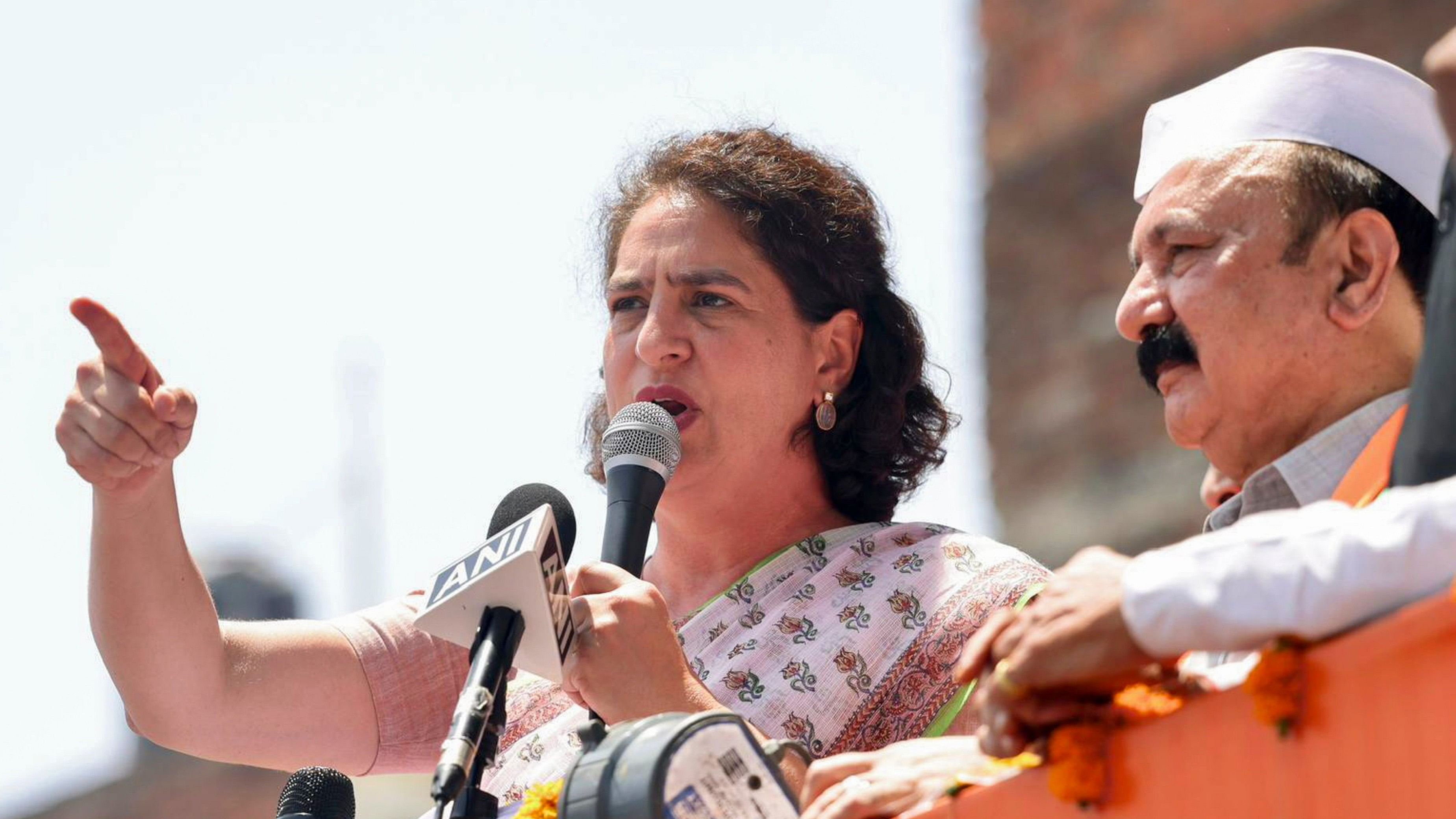 <div class="paragraphs"><p>Congress leader Priyanka Gandhi Vadra with the party candidate from Amethi Kishori Lal Sharma during a roadshow before filing his nomination for the Lok Sabha elections, in Amethi district. </p></div>