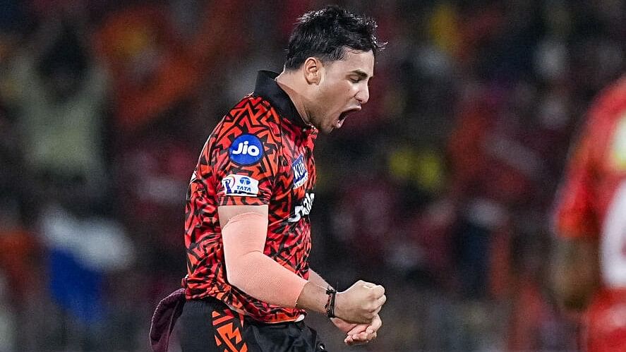 <div class="paragraphs"><p>Sunrisers Hyderabad bowler Abhishek Sharma celebrates after taking the wicket of Rajasthan Royals batter Shimron Hetmyer during the Indian Premier League (IPL) Qualifier 2 cricket match between Rajasthan Royals and Sunrisers Hyderabad, at MA Chidambaram Stadium, in Chennai, Friday, May 24, 2024.</p></div>