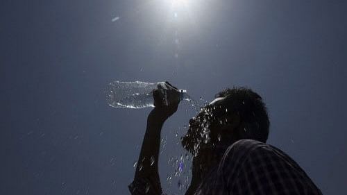 <div class="paragraphs"><p>Representative image showing a man trying to cope with a heatwave.</p></div>