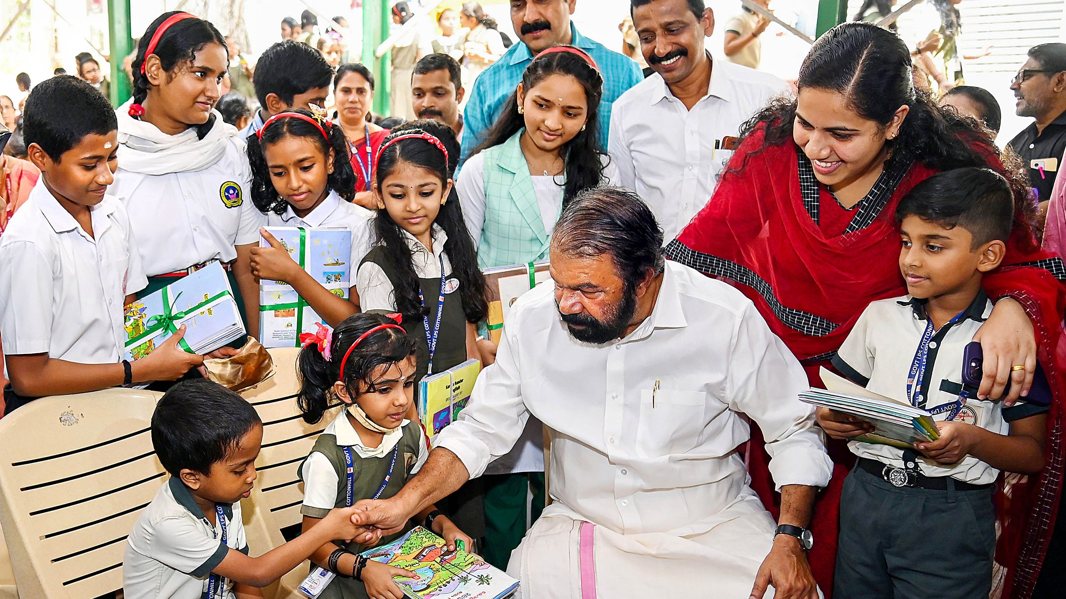 <div class="paragraphs"><p>Thiruvananthapuram: Kerala Minister for General Education V. Sivankutty interacts with students during distribution of school textbooks for the 2024-25 academic year. </p></div>