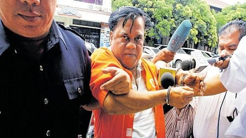 <div class="paragraphs"><p>Gangster Chhota Rajan handcuffed.</p></div>