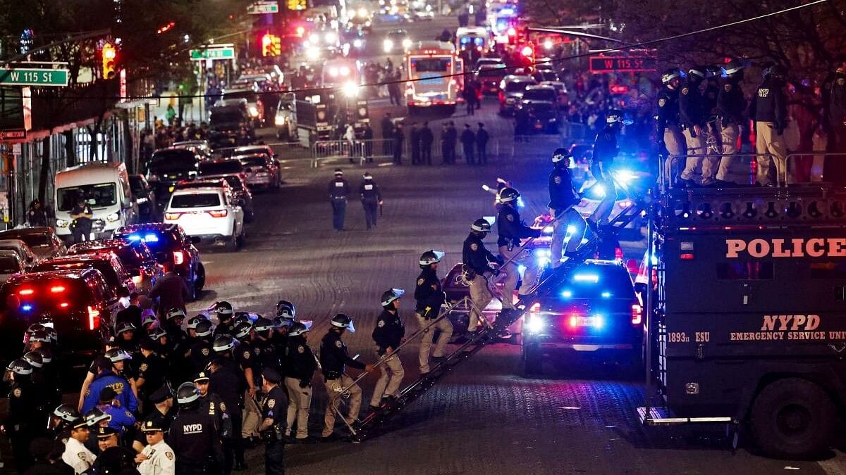 <div class="paragraphs"><p>Police use a vehicle named "the bear" to enter Hamilton Hall from a public street, which was occupied by protesters, as other officers enter the campus of Columbia University. Image for representative purpose only.&nbsp;</p></div>