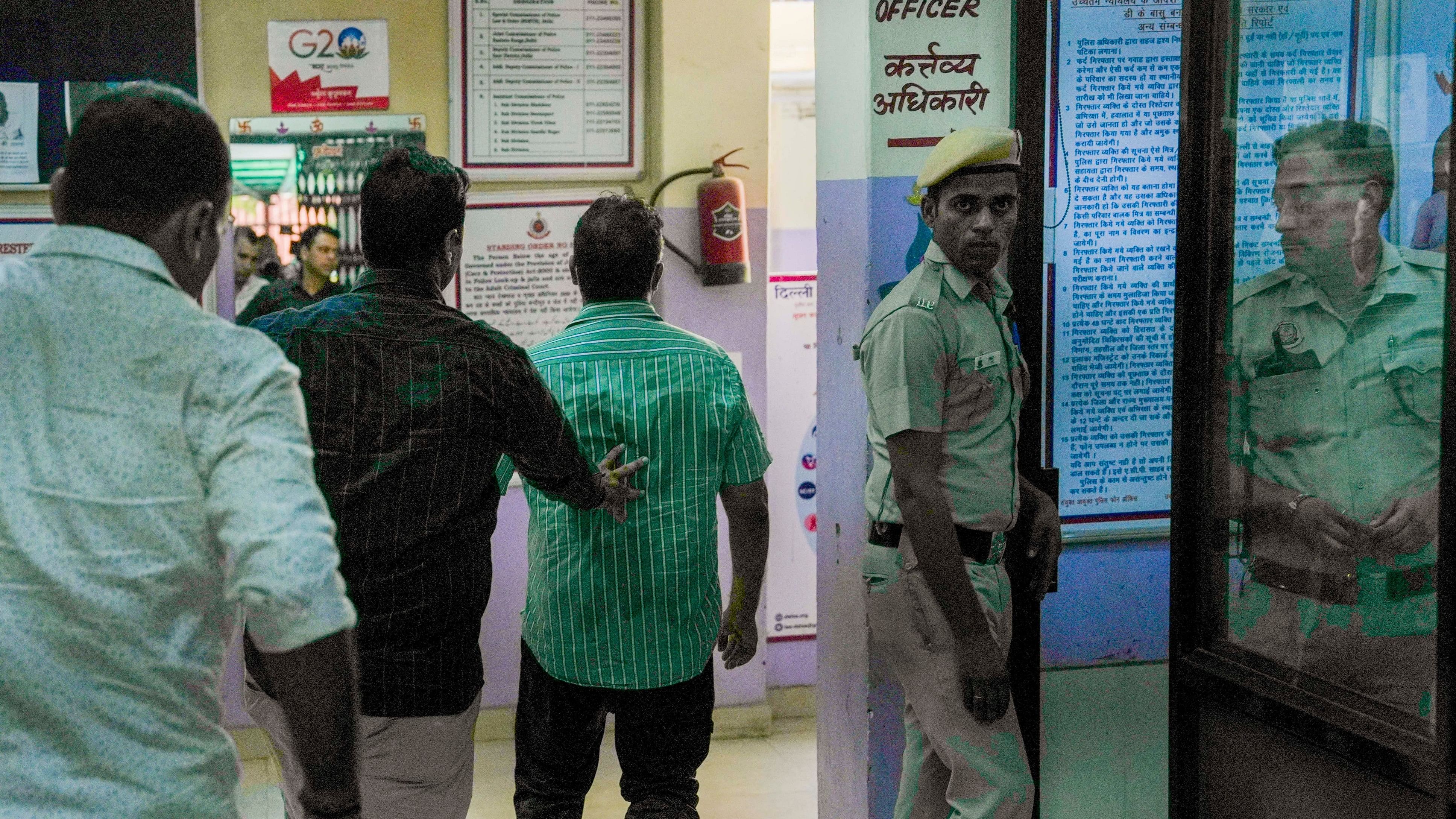 <div class="paragraphs"><p>Dr. Naveen Khichi, the owner of Baby Care New Born Child Hospital, being taken to custody after they were produced before the Karkardooma Court in hospital fire case, in New Delhi, Monday, May 27, 2024. </p></div>