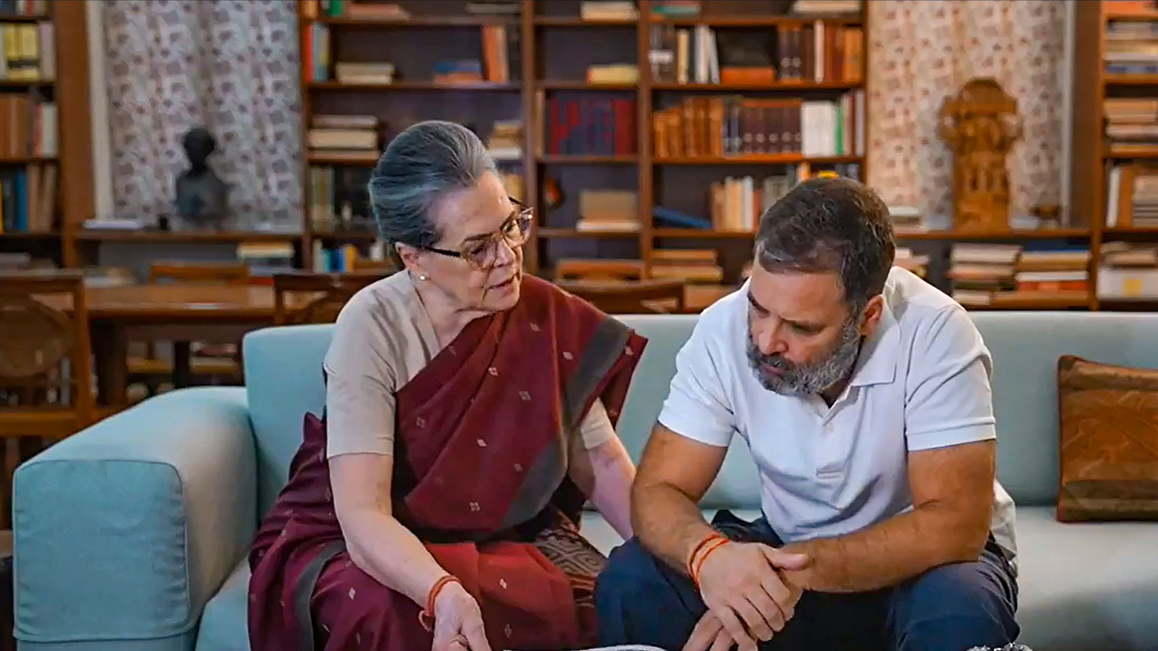 <div class="paragraphs"><p>Congress leaders Sonia Gandhi and Rahul Gandhi look at album of the Gandhi family's work in Amethi and Raebareli constituencies. </p></div>