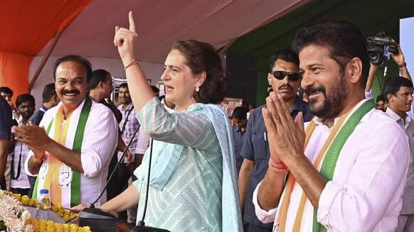 <div class="paragraphs"><p>Telangana Chief Minister Revanth Reddy with Congress leader Priyanka Gandhi Vadra during a public meeting for the Lok Sabha elections, at Tandur, in Vikarabad district, Saturday, May 11, 2024.</p></div>