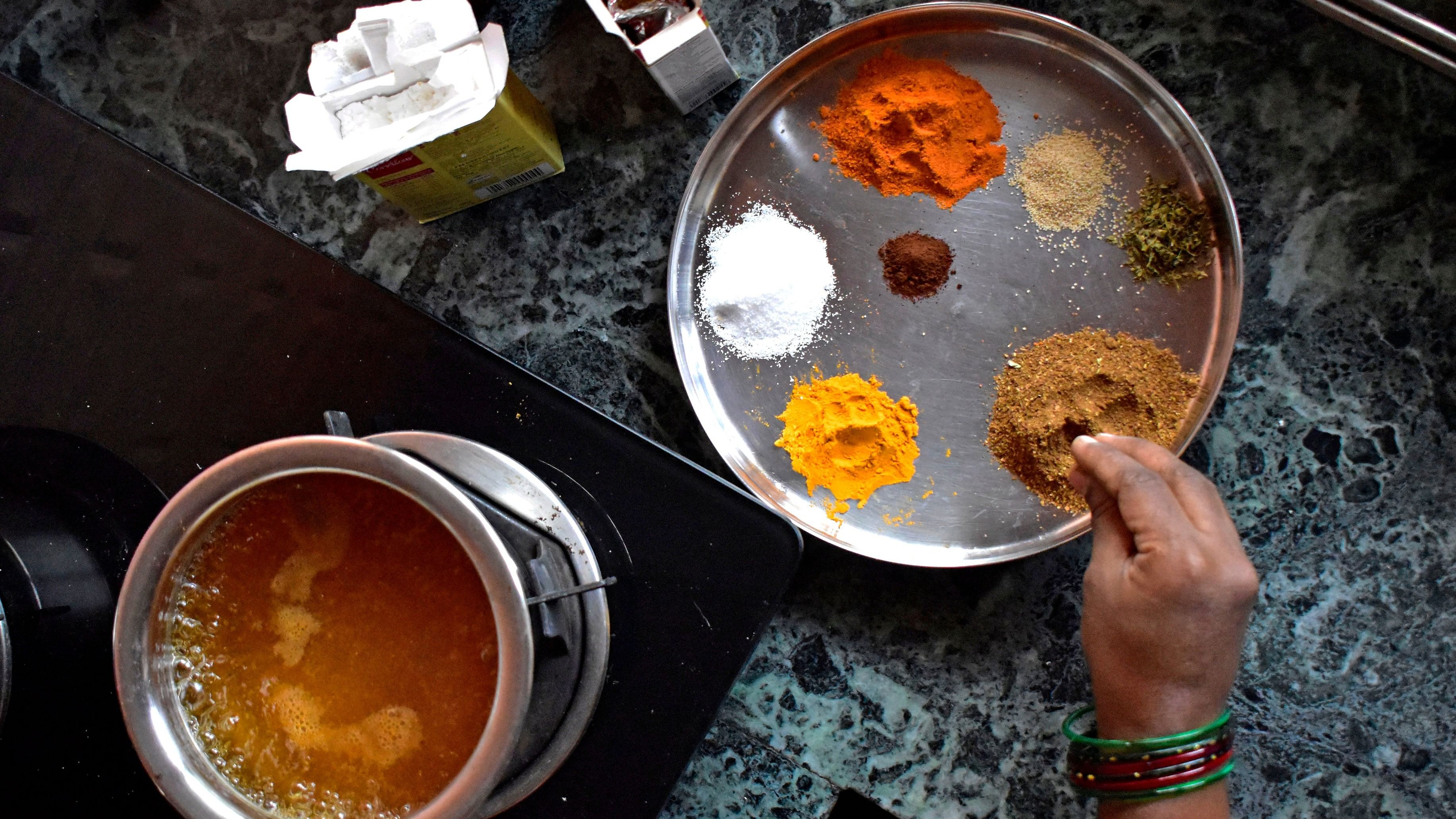 <div class="paragraphs"><p>In the past two decades, about 40,000 food items manufactured in India were found to violate the US Food and Drug Administration standards. In pic, a woman uses spices available in the domestic market. </p></div>