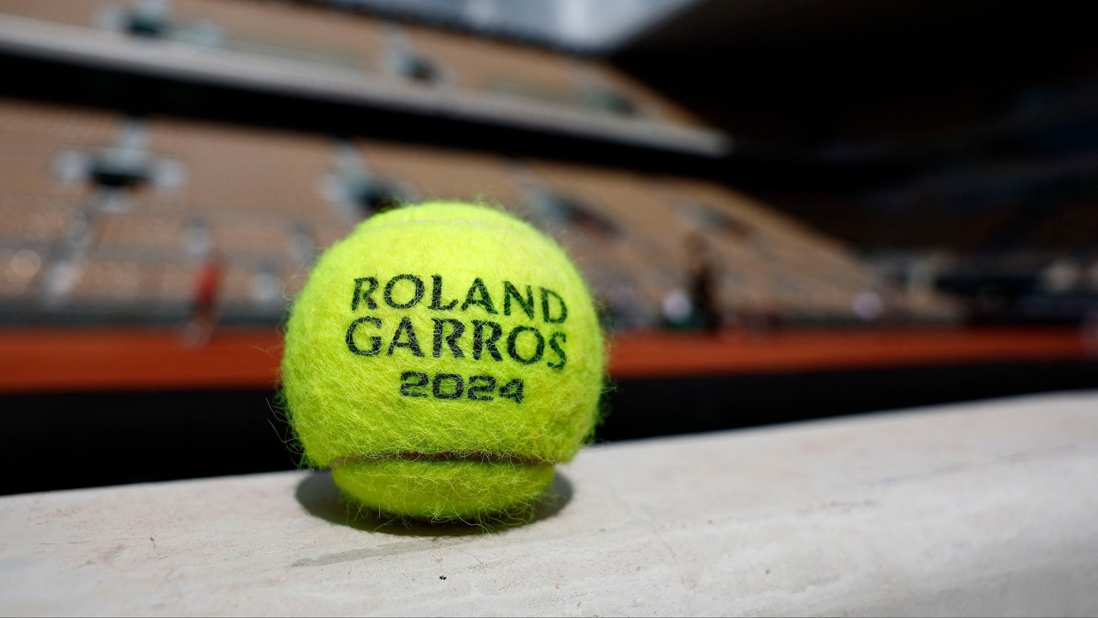 <div class="paragraphs"><p> A Roland Garros 2024 tennis ball is seen placed ahead of the French Open.</p></div>