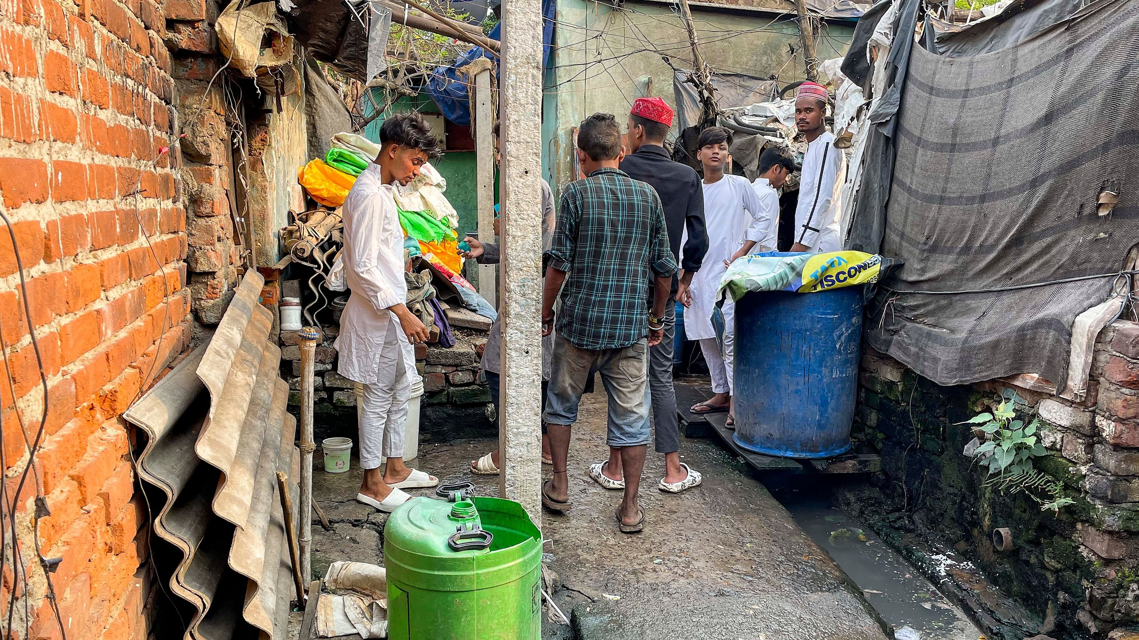 <div class="paragraphs"><p> A clogged drain runs in front of a dwelling at the Kharagpur Gandhi Nagar Bustee.   </p></div>