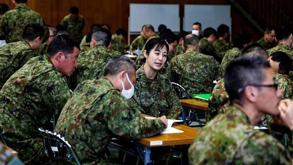 <div class="paragraphs"><p>Japan Ground Self-Defence Force (JGSDF) soldiers participate in a seminar to prevent harassment at JGSDF Camp Asaka, in Tokyo.</p></div>