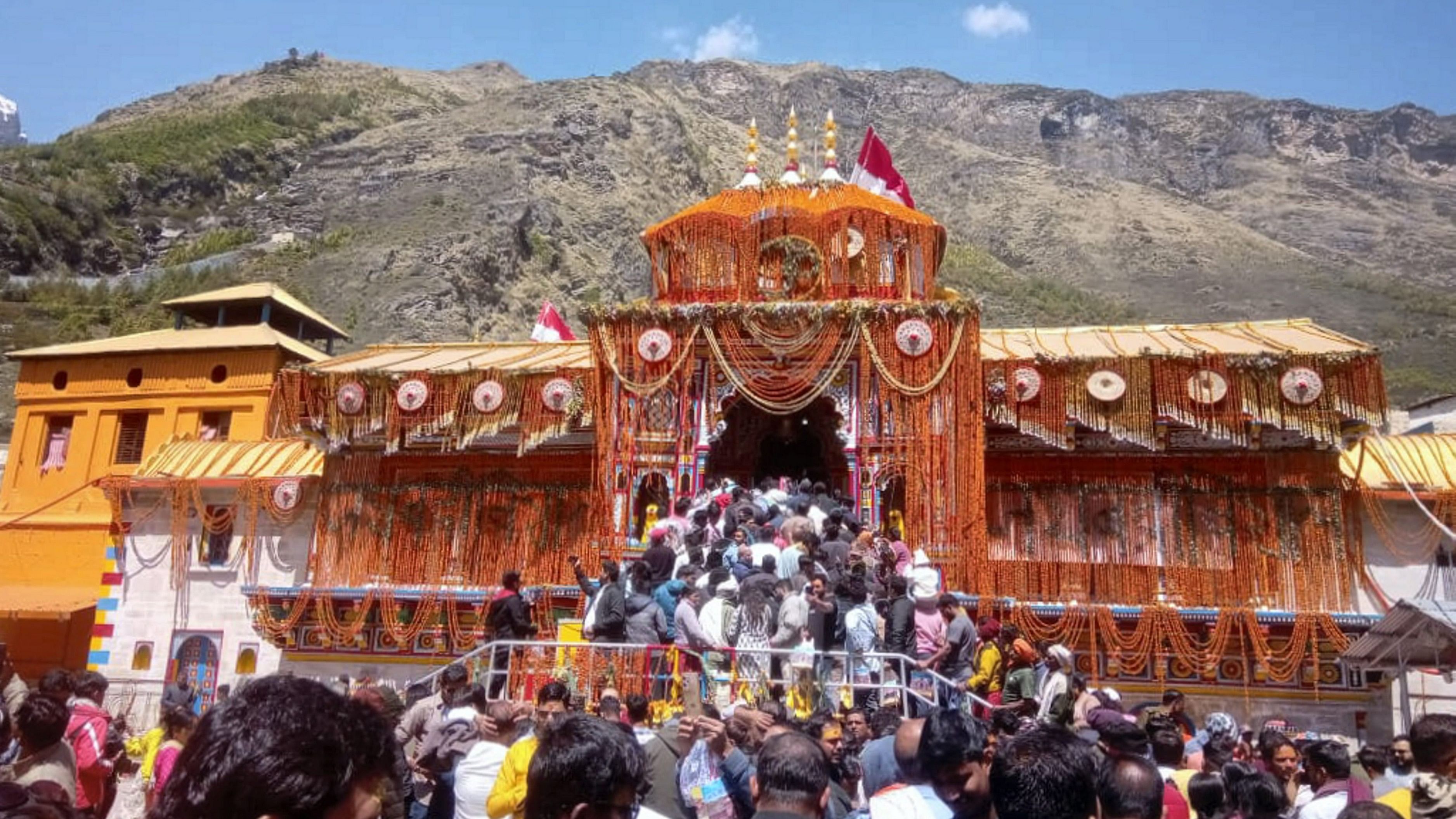 <div class="paragraphs"><p> Devotees at Badrinath Temple during the 'Char Dham Yatra', in Chamoli district, Sunday, May 19, 2024. </p></div>