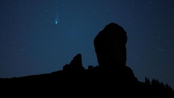 <div class="paragraphs"><p>A comet  photographed over the Roque Nublo Natural Monument in Tejeda, on Gran Canaria Island, Spain. Representative image.</p></div>