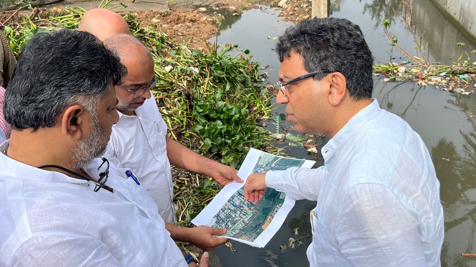 <div class="paragraphs"><p>Deputy Chief Minister DK Shivakumar, along with a team of officials from various civic departments, inspects rain-hit areas in Yelahanka on Monday.&nbsp;</p></div>