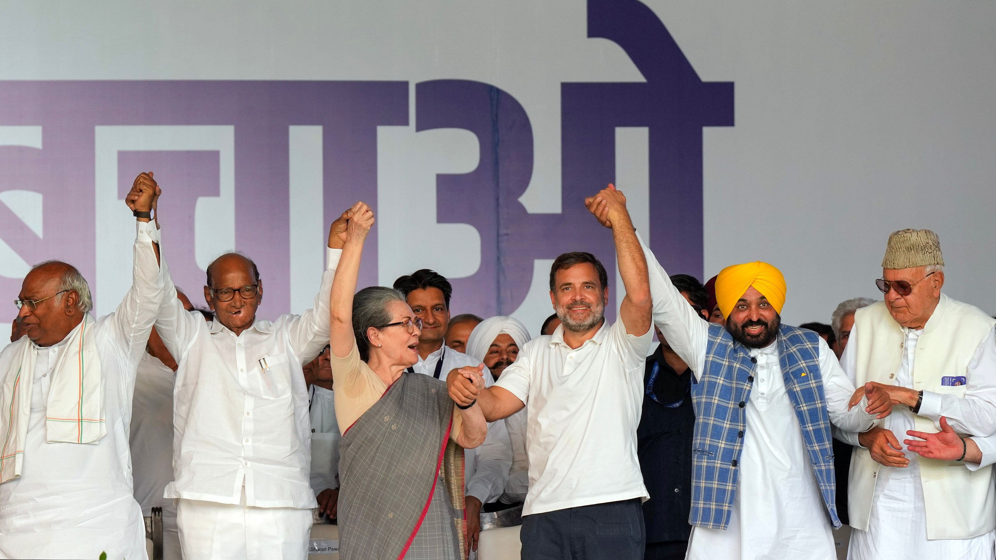 <div class="paragraphs"><p>Opposition leaders&nbsp;join hands during I.N.D.I.A. bloc's 'Loktantra Bachao Rally' at Ramleela Maidan, in New Delhi.</p></div>