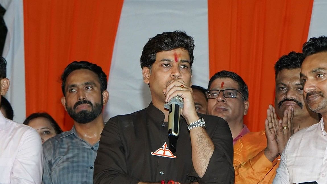 <div class="paragraphs"><p>Shrikant Shinde speaks at a Shiv Sena public meeting.</p></div>