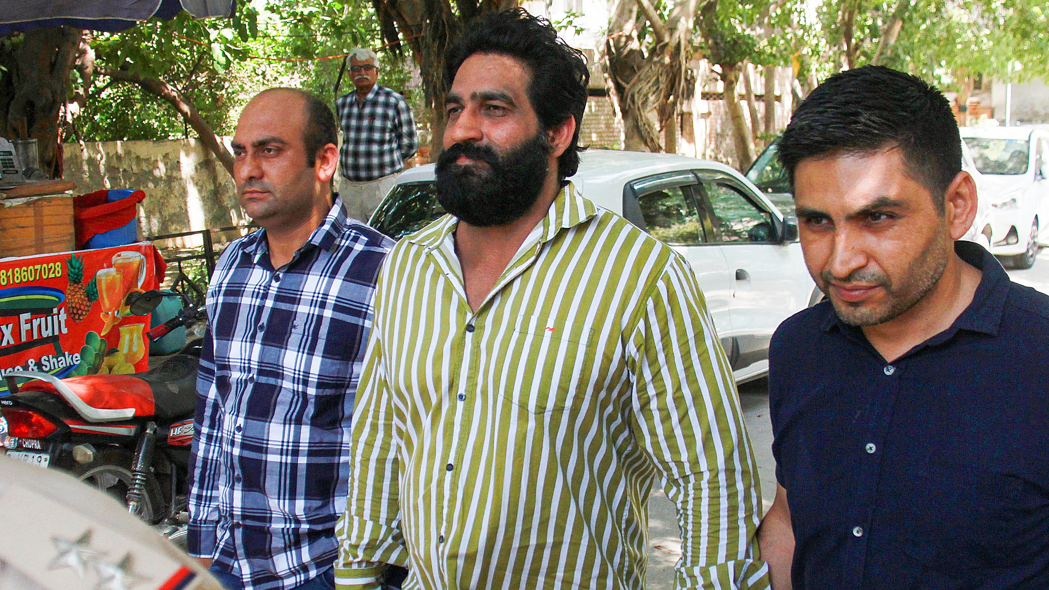 <div class="paragraphs"><p>Social media influencer Balwant Kataria alias Bobby Kataria being produced before a local court after he was arrested by the Gurugram police in a case of human trafficking, at Bajghera Police Station in Gurugram, Tuesday, May 28, 2024. </p></div>