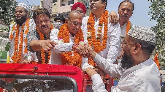 <div class="paragraphs"><p>Congress candidate from Chandni Chowk constituency Jai Prakash Aggarwal during a roadshow for Lok Sabha elections, in New Delhi, Saturday, May 18, 2024.</p></div>