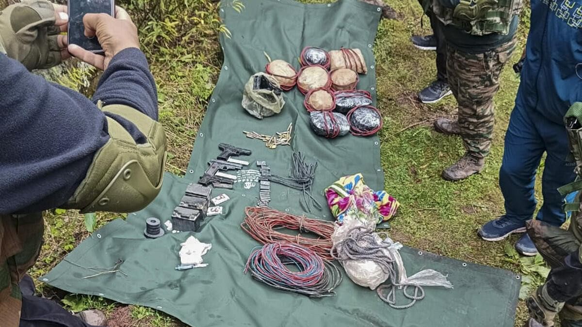 <div class="paragraphs"><p>Arms, explosives and other items recovered by security personnel from a terrorist hideout during an operation, at Mahore in Reasi district.</p></div>