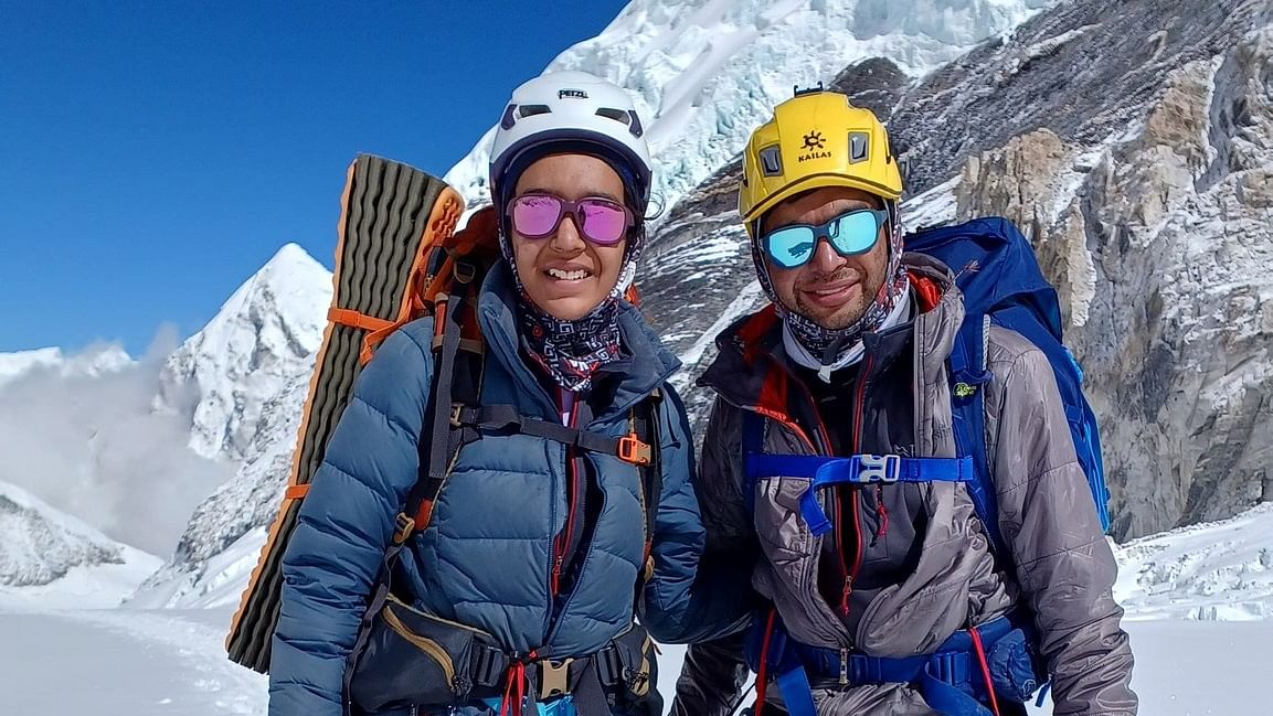 <div class="paragraphs"><p>Kaamya Karthikeyan (left) and Commander S Karthikeyan strike a happy pose after scaling Mount Everest.&nbsp;</p></div>