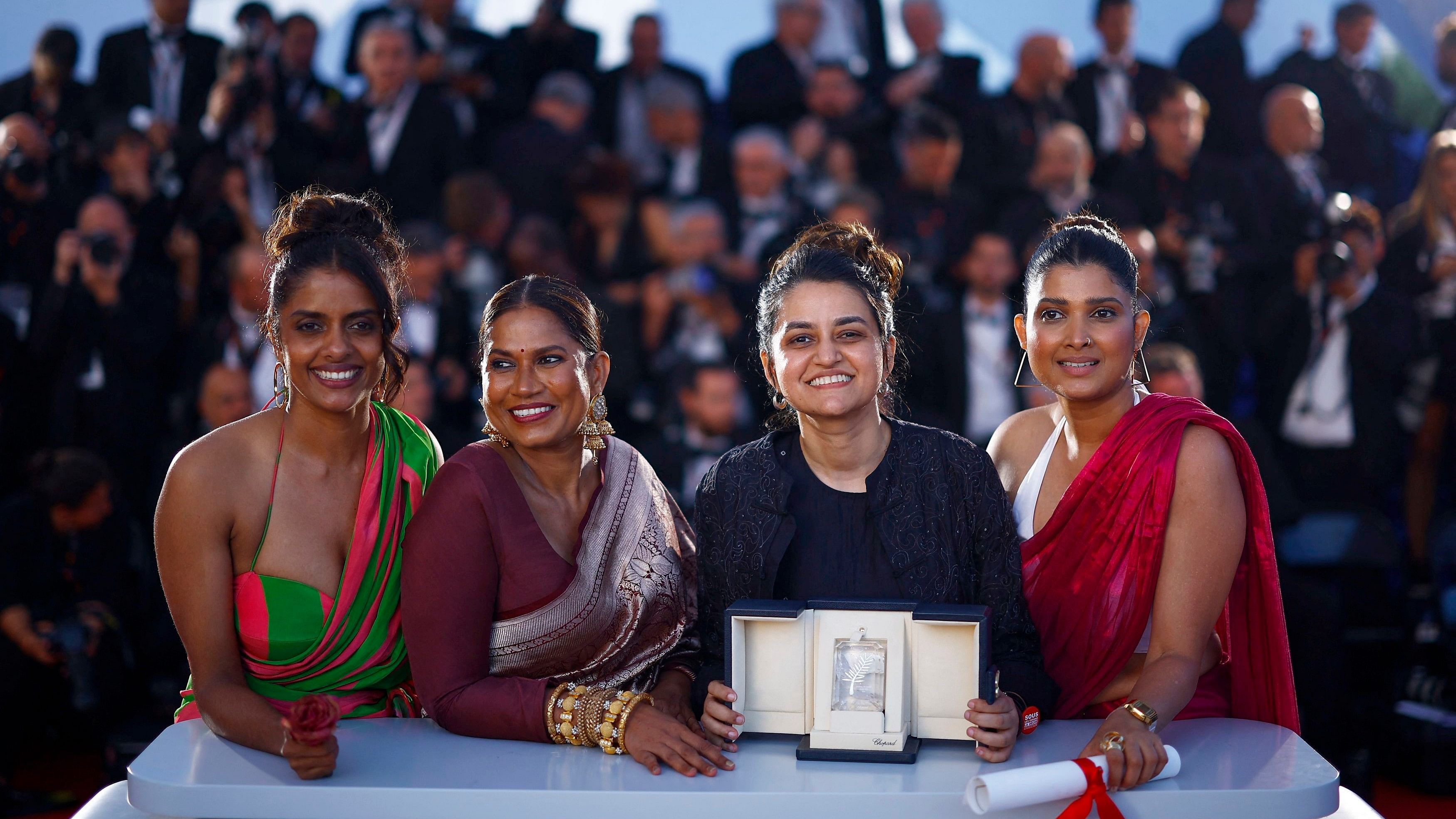 <div class="paragraphs"><p>Director Payal Kapadia (second right) Grand Prix award winner for the film <em>All We Imagine as Light</em> poses with cast members Divya Prabha (right) Kani Kusruti (left) and Chhaya Kadam (second left) during a photocall after the closing ceremony of the 77th Cannes Film Festival in Cannes, France.</p></div>