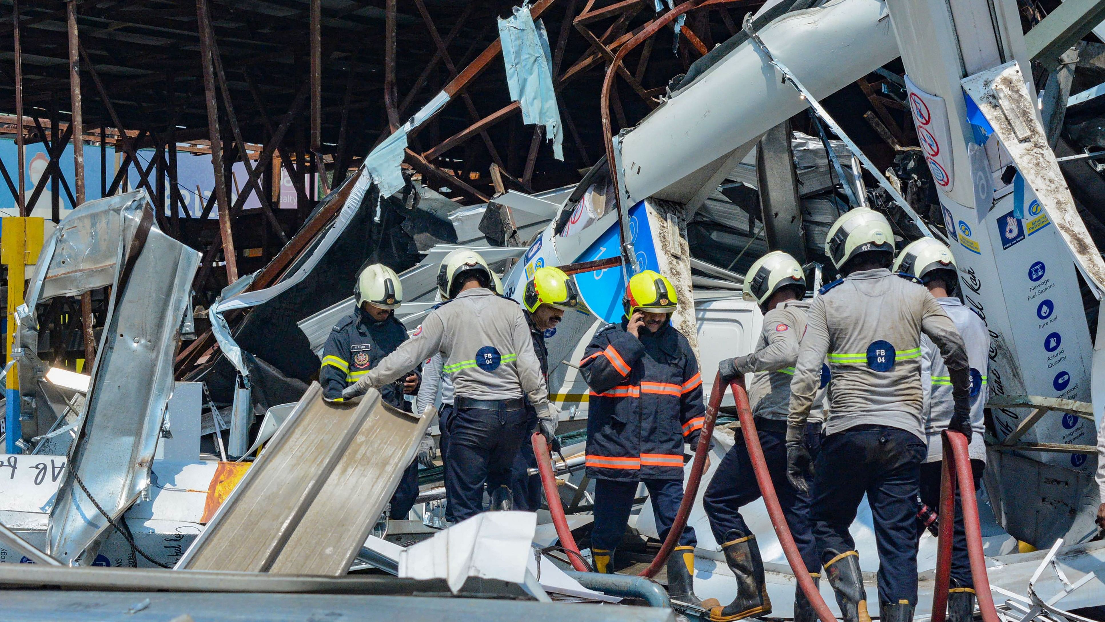 <div class="paragraphs"><p>Fire Brigade personnel seen cooling the site of the hoarding collapse at Ghatkopar, in Mumbai, Tuesday, May 14, 2024. </p></div>