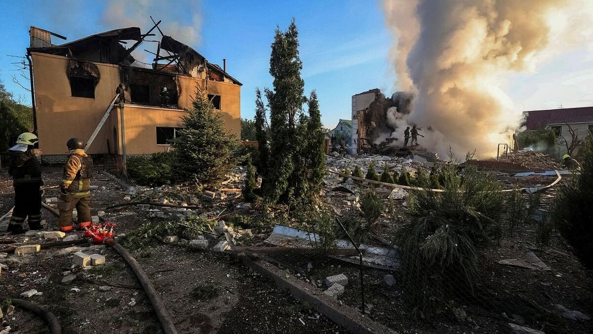 <div class="paragraphs"><p>Firefighters work at a site of a Russian missile strike, amid Russia's attack on Ukraine, in Kharkiv.</p></div>