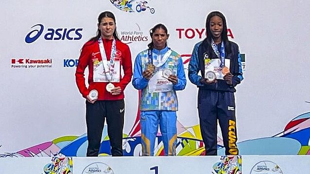 <div class="paragraphs"><p>Deepthi Jeevanji (C) at the victory ceremony after winning gold at World Para Athletics Championships in Kobe, Japan</p></div>