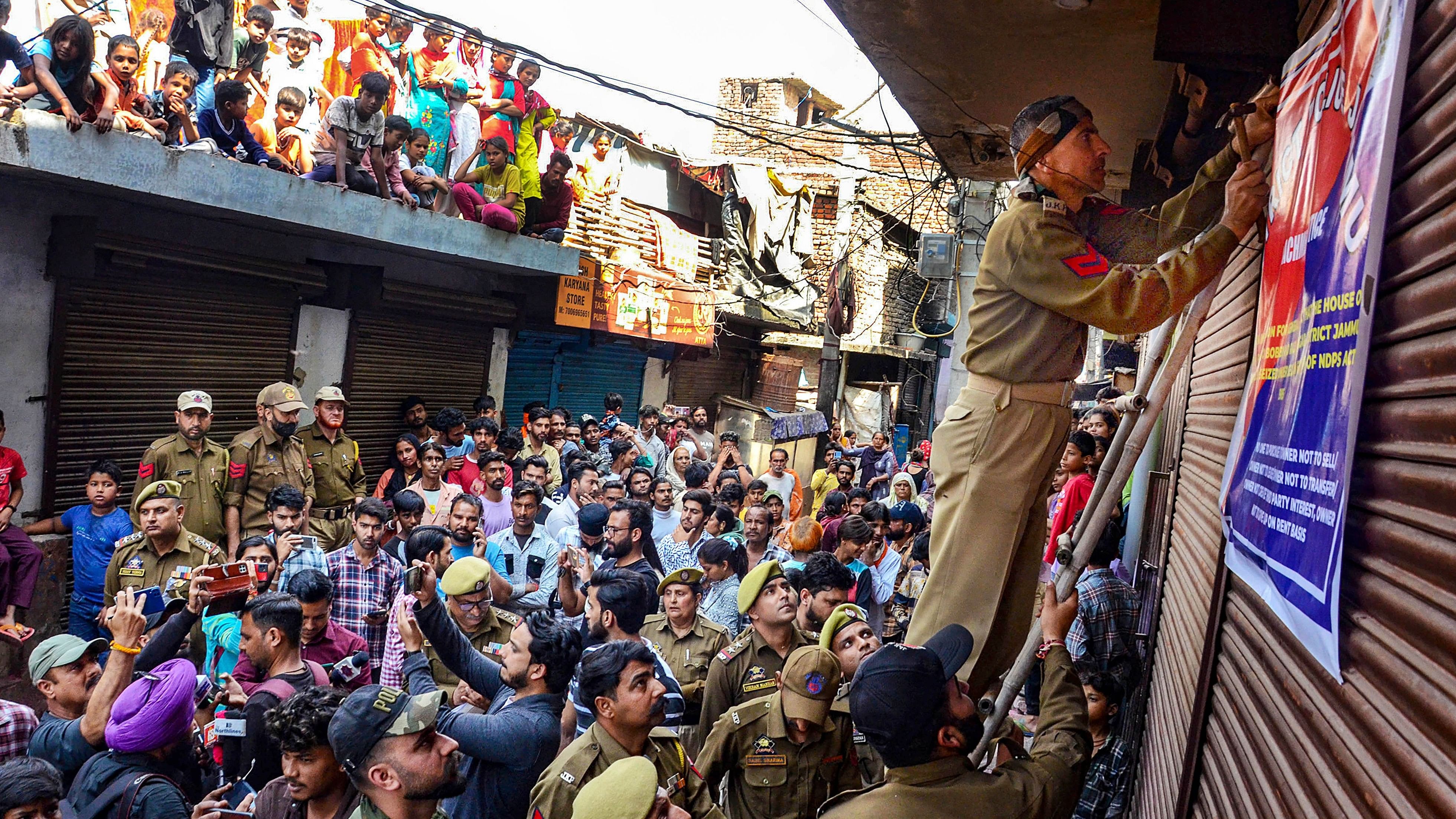 <div class="paragraphs"><p>Jammu &amp; Kashmir Police attaches properties belonging to an alleged drug peddler. (Representative image)</p></div>