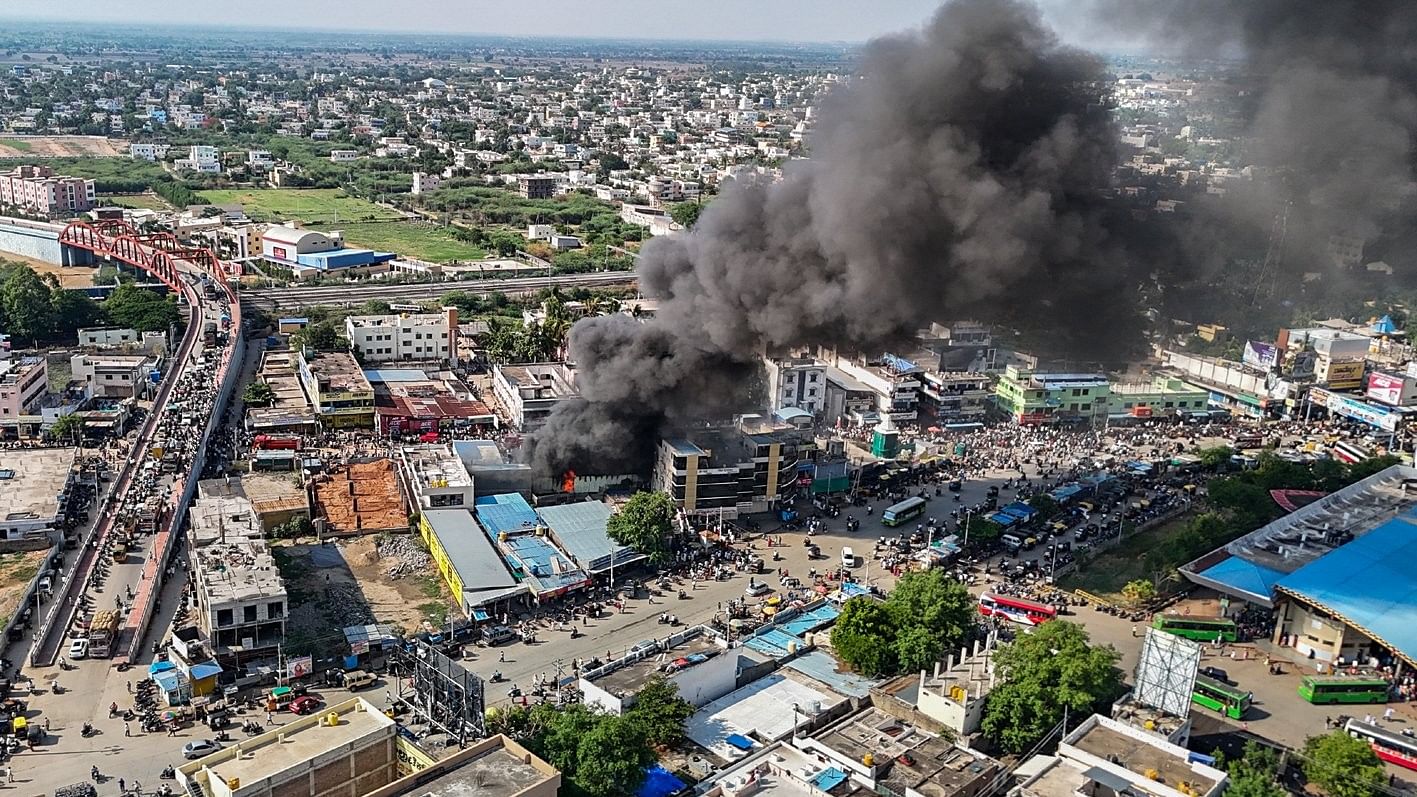 <div class="paragraphs"><p>Thick smoke seen billowing from a paint shop that caught fire in Koppal on Monday afternoon. </p></div>