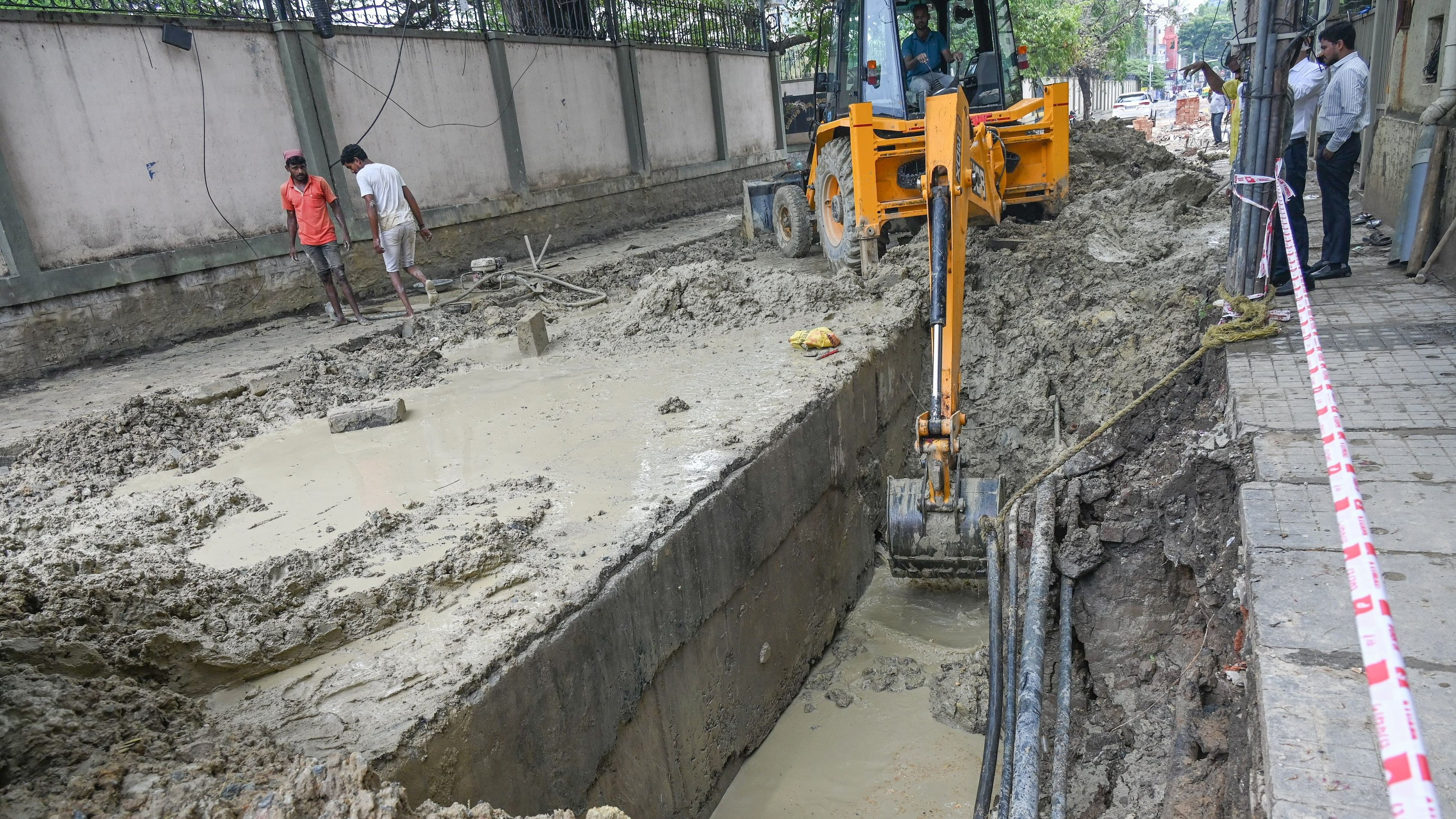 <div class="paragraphs"><p>Magrath Road is being dug up for the laying of underground sewage pipes by BWSSB in Bengaluru on Friday.&nbsp;</p></div>