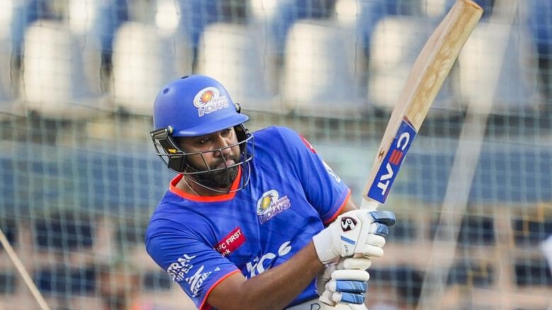 <div class="paragraphs"><p> Mumbai Indians player Rohit Sharma during a practice session.</p></div>