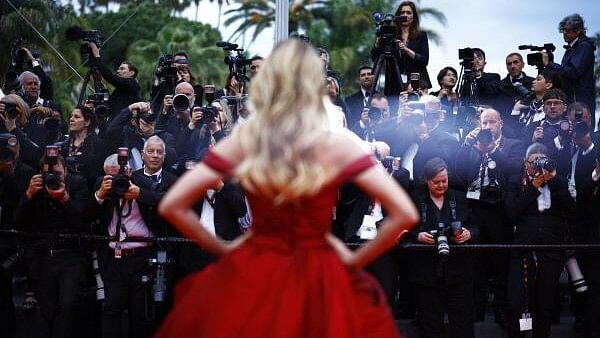 <div class="paragraphs"><p>Photographers take pictures during arrivals  at the 77th Cannes Film Festival in Cannes, France.</p></div>