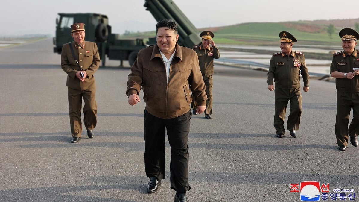 <div class="paragraphs"><p>North Korean leader Kim Jong Un inspects the country's artillery weapon system and attends the test-firing of such weapons</p></div>