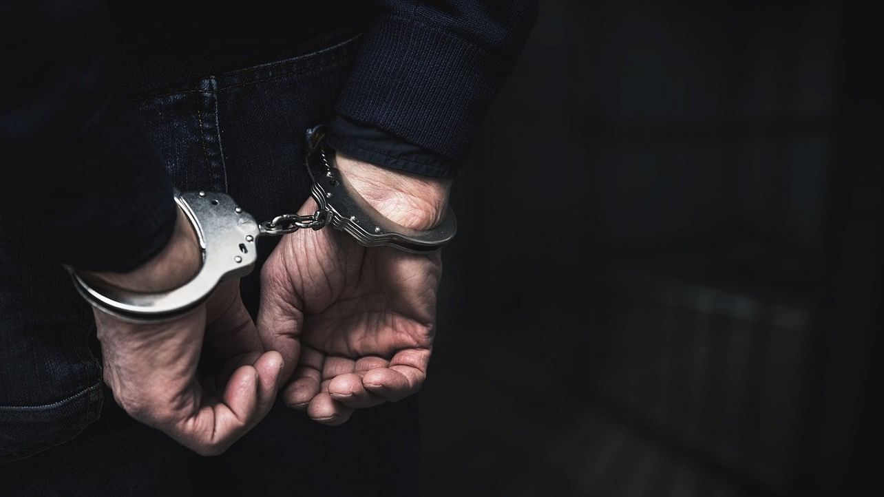 <div class="paragraphs"><p>Representative image showing a man in handcuffs.</p></div>