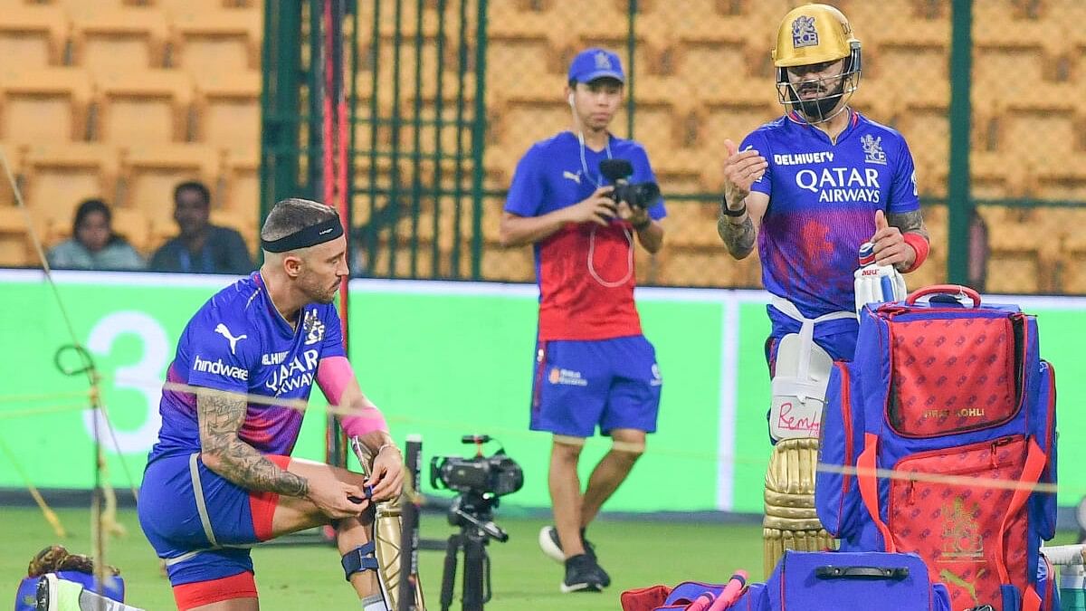 <div class="paragraphs"><p>Virat Kohli and Faf Du Plessis during Royal Challengers Bengaluru’s training session ahead of their IPL match against Gujarat Titans at the M Chinnaswamy stadium in Bengaluru on Friday.&nbsp;</p></div>