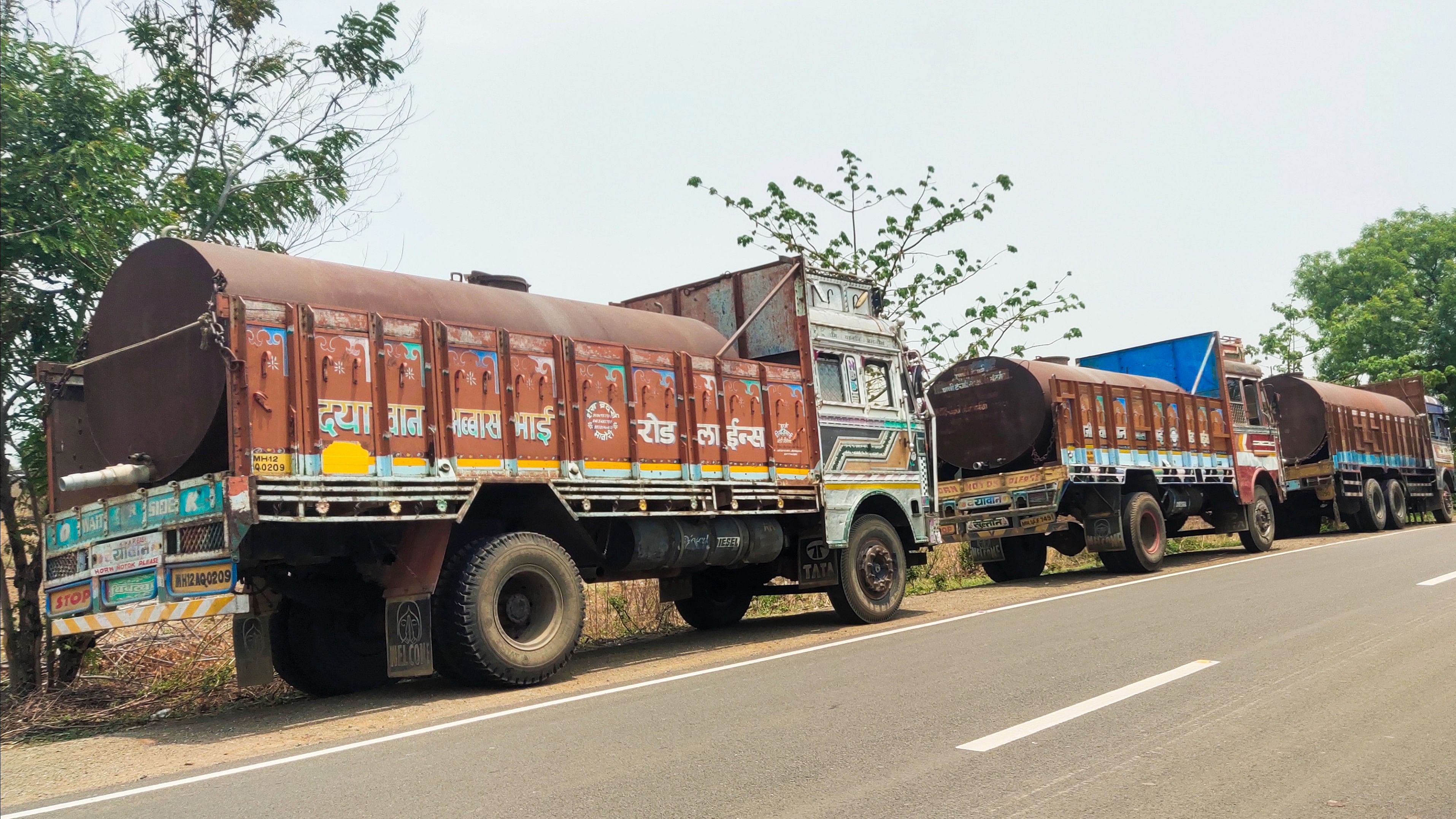 <div class="paragraphs"><p>Water tankers stand in a queue at Banegaon filing point located on Jalna-Bhokardan road, in Jalna. Each tanker requires nearly an hour to refill. The villages around Banegaon are facing severe drought. </p></div>