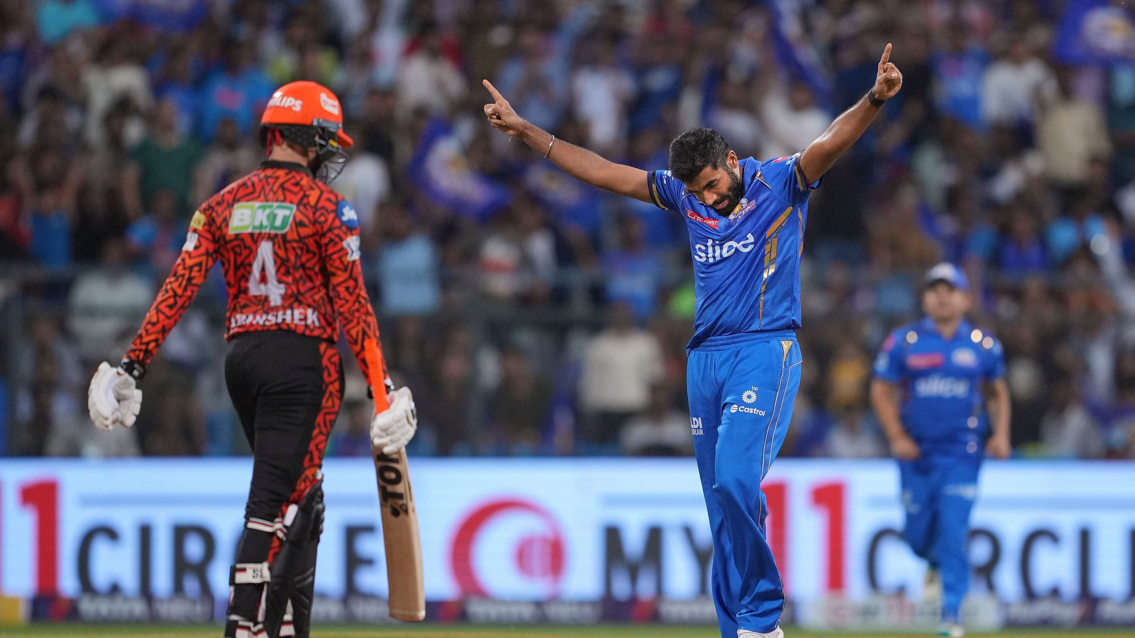 <div class="paragraphs"><p>Mumbai Indians bowler Jasprit Bumrah celebrates the wicket of Sunrisers Hydrabad batter Abhishek Sharma, at Wankhede Stadium in Mumbai, Monday, May 6, 2024. </p></div>