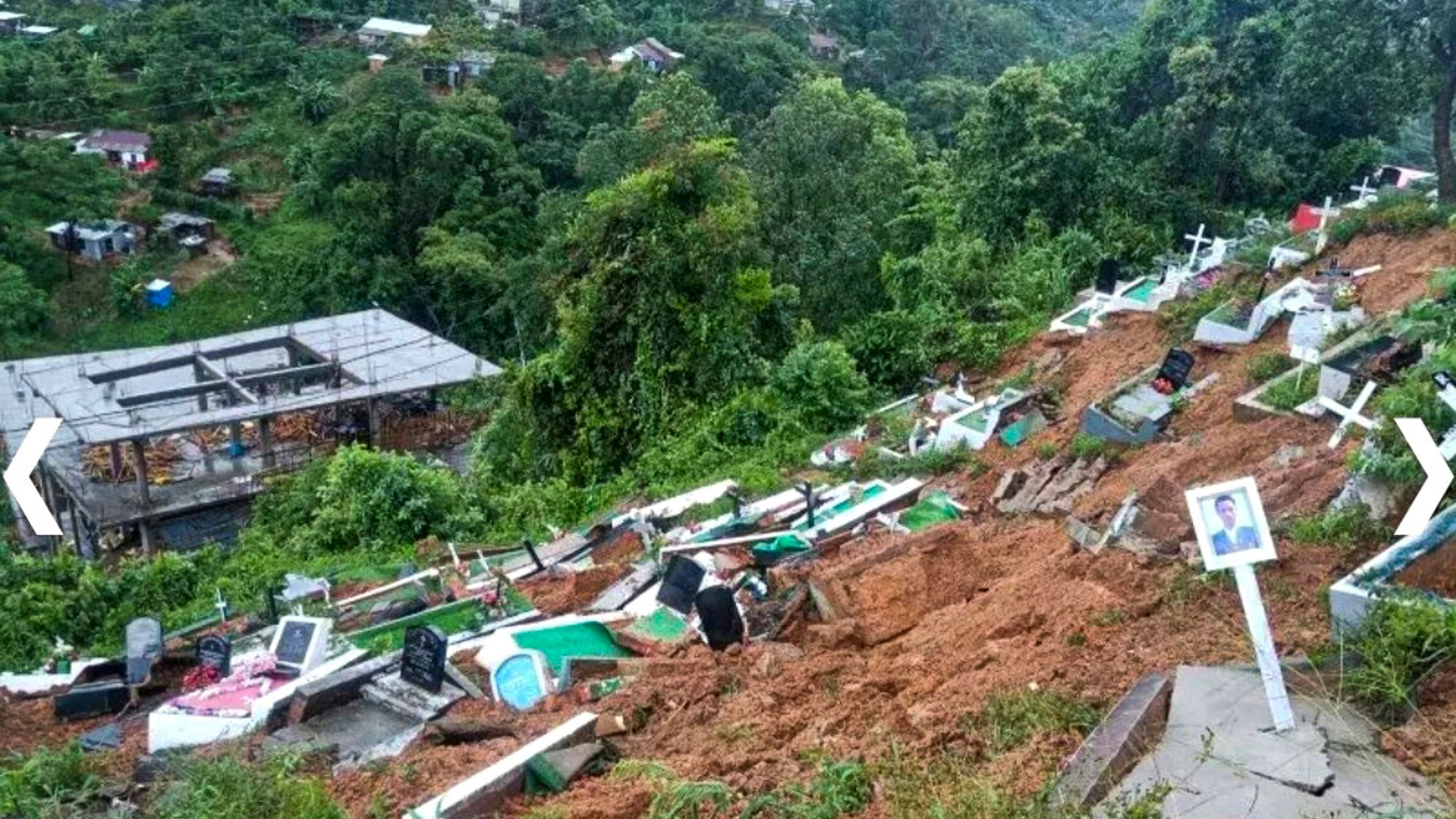 <div class="paragraphs"><p> View of graves after being swept away in a landslide, amid heavy rain in the aftermath of Cyclone Remal in Aizawl district </p></div>