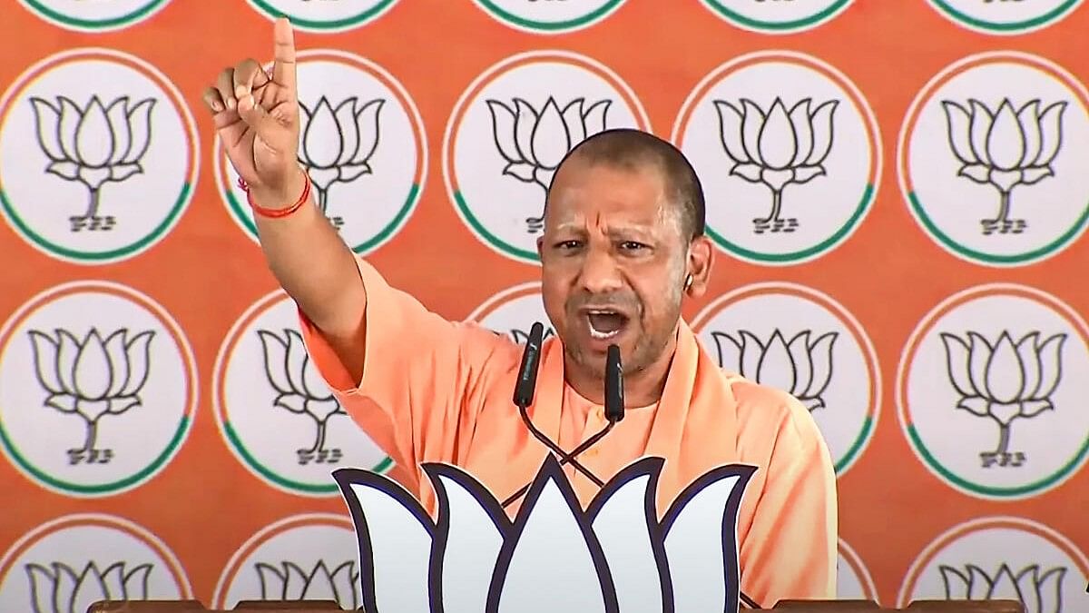 <div class="paragraphs"><p>Uttar Pradesh Chief Minister Yogi Adityanath speaks during a public meeting of Prime Minister Narendra Modi for Lok Sabha elections, in Basti.</p></div>