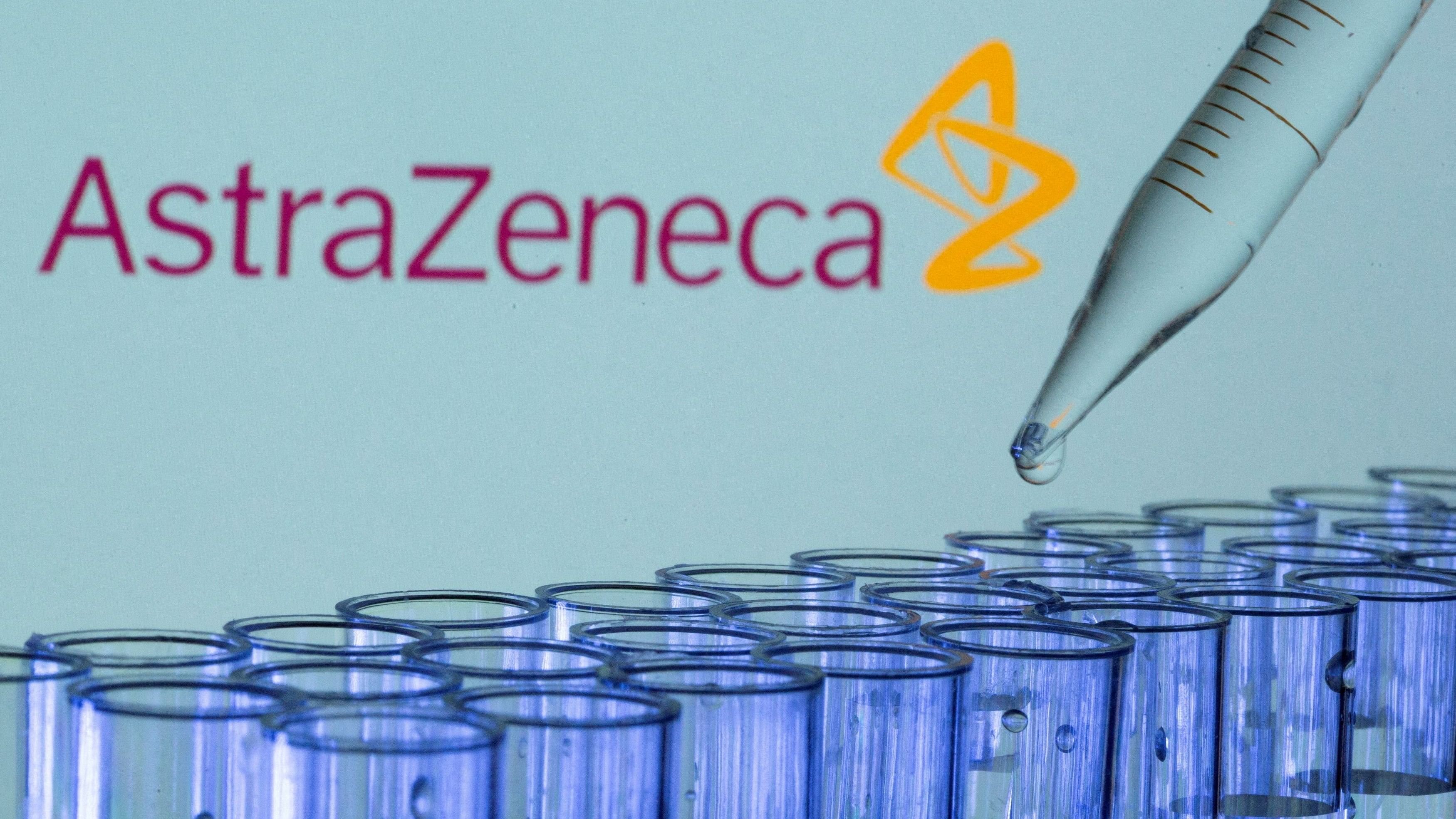 <div class="paragraphs"><p>Test tubes are seen in front of a displayed AstraZeneca logo.</p></div>