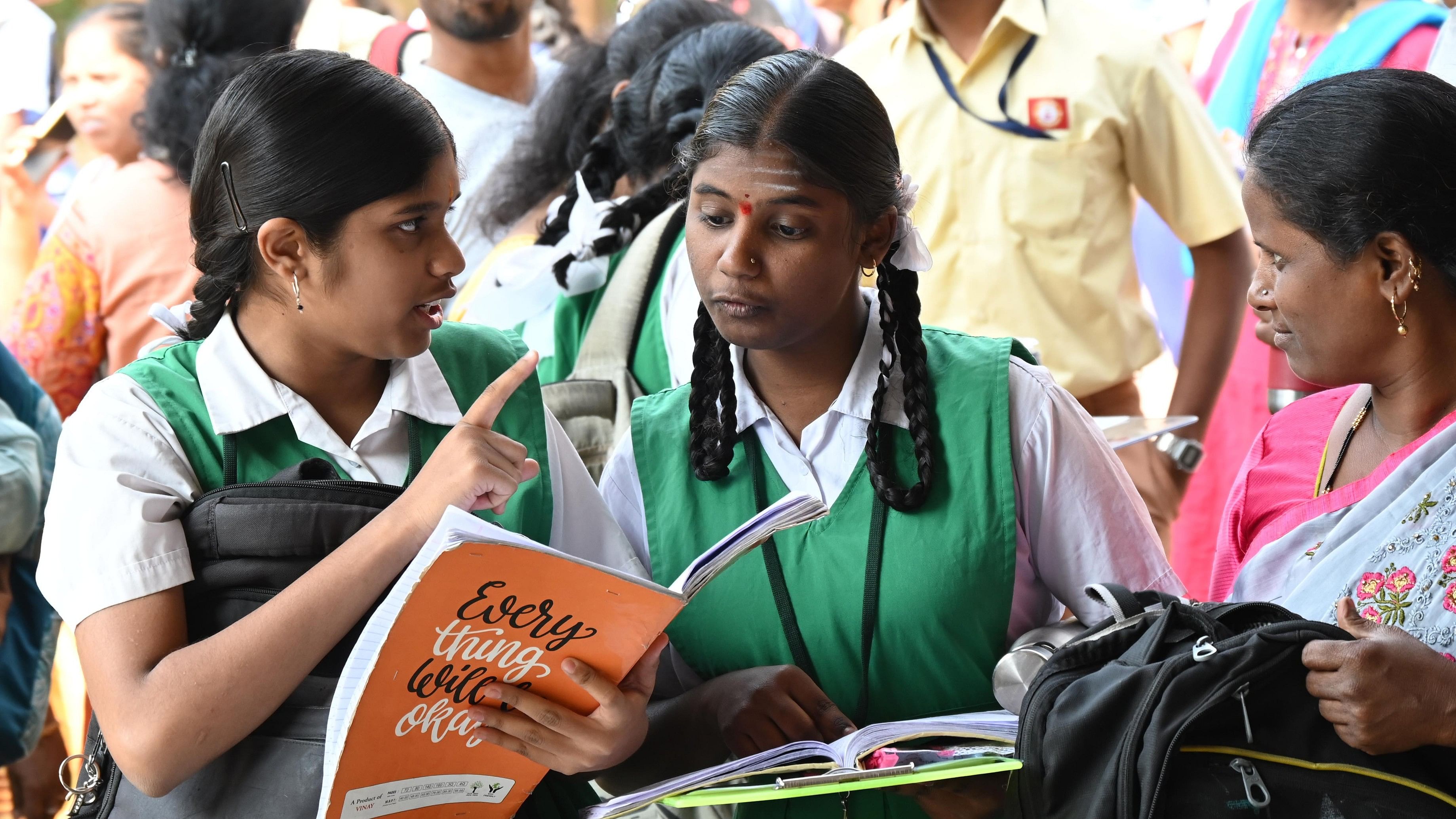 <div class="paragraphs"><p>Students along with their parents at the Government school campus on the first day of SSLC exam.&nbsp;</p></div>