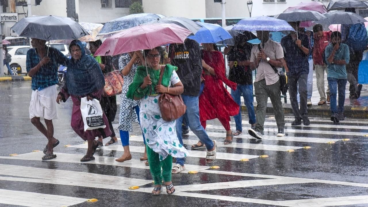 <div class="paragraphs"><p>Representative image showing pedestrians walking on a road in rains.</p></div>