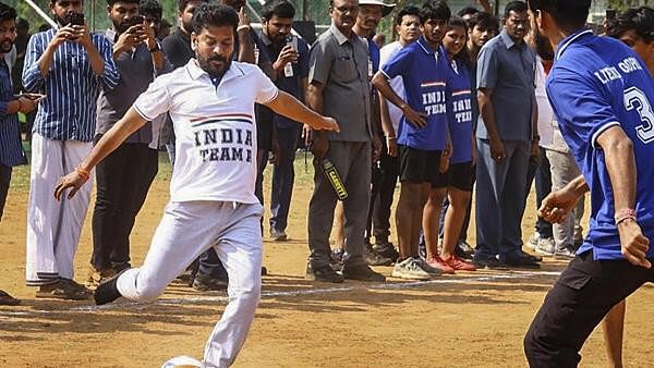 <div class="paragraphs"><p>Telangana Chief Minister A. Revanth Reddy plays football with students of University of Hyderabad, in Hyderabad.</p></div>