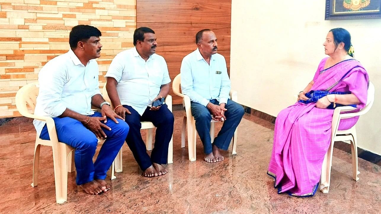 <div class="paragraphs"><p>MLA C N Balakrishna, Hassan JD(S) unit president K S Lingesh hold discussion with Bhavani Revanna at MLA H D Revanna's residence in Holenarsipur, Hassan district, on Monday. </p></div>